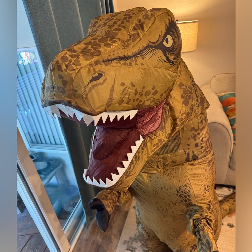 Kids inflatable T-Rex Halloween costume.